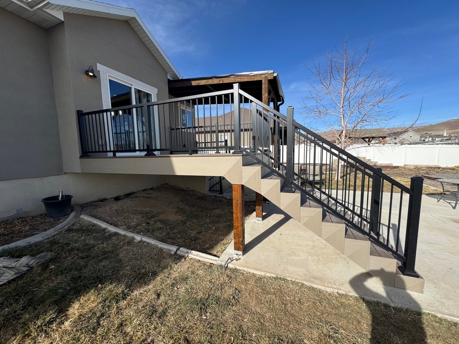 Elevated deck stairs and railing built for a Utah County home